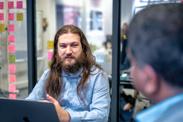 Technical Director and analyst reviewing ransomware prevention techniques