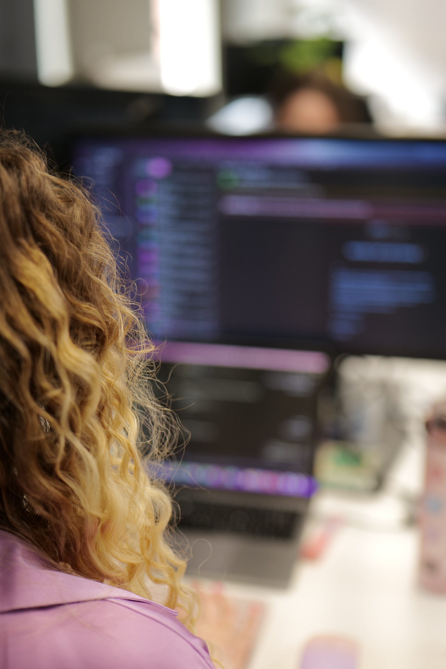 An employee reviewing their inbox, underscoring the need to be vigilant against phishing attacks and other vulnerabilities reported in April 2024