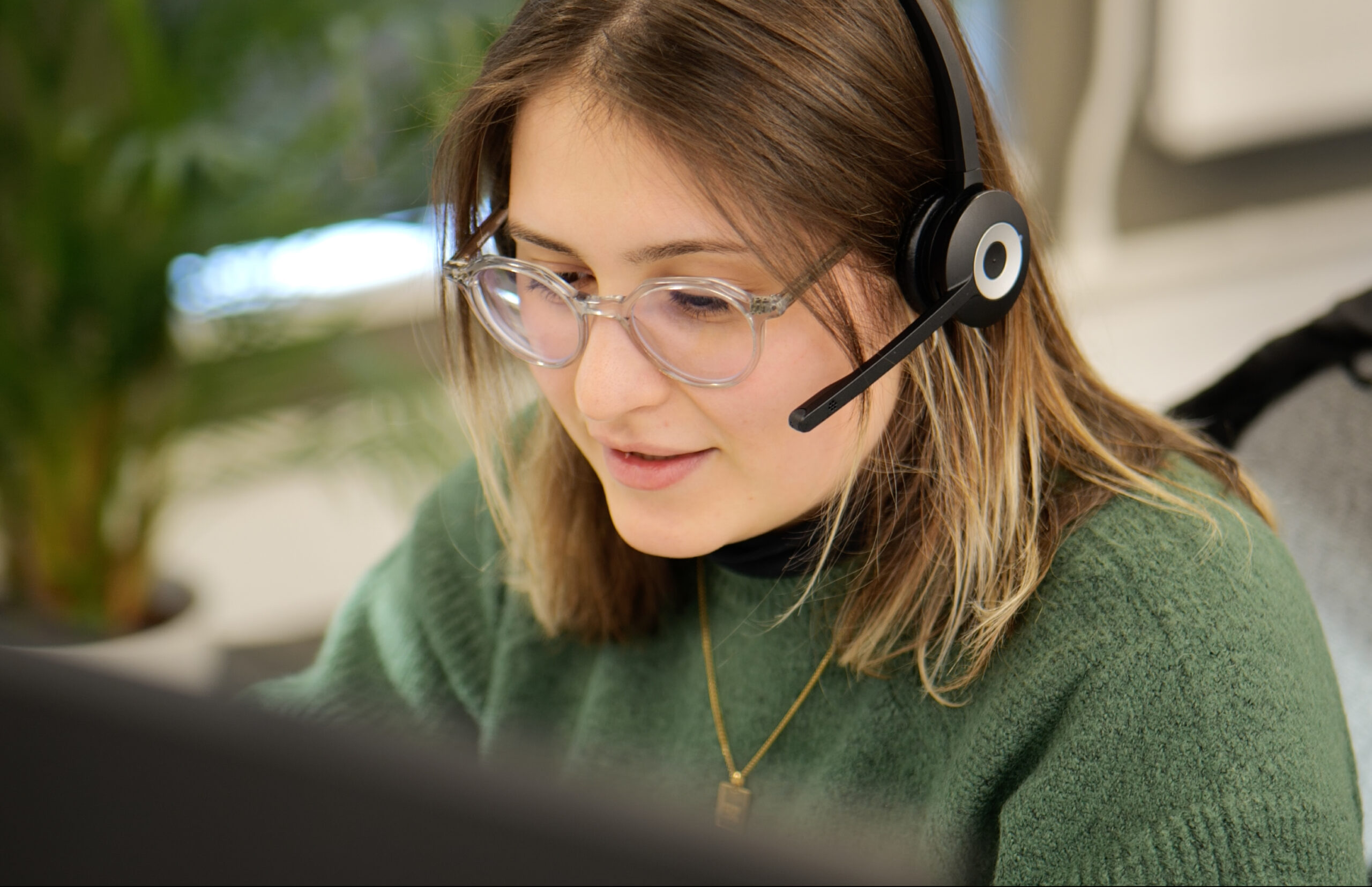 Cyber security team member taking a call from a client regarding ISO 42001 certification